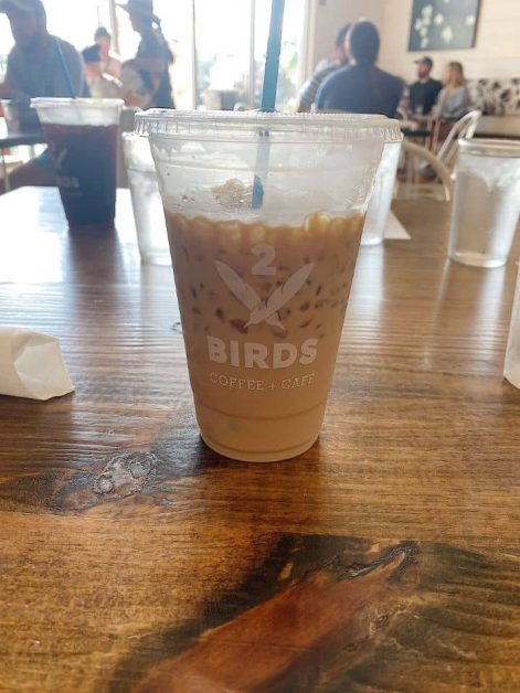 The iced honey vanilla latte served at 2 Birds Coffee Shop in Destin, Florida.