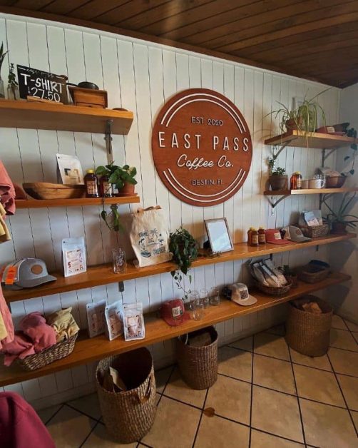 The beachy aesthetic and wooden interior of East Pass Coffee shop in Destin, Florida.