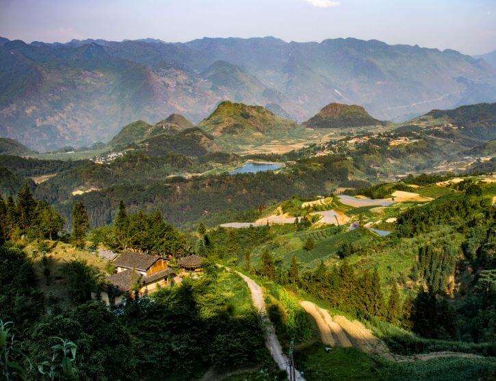 The views of the winding roads and villages while motorbiking along the Ha Giang Loop in Vietnam on the list of 100 things to do before you die.