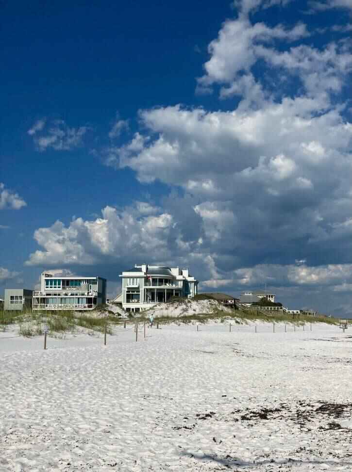 The white sands, blue skies, and enormous beach houses along Grayton Beach in 30A offering some of the best things to do in 30A, Florida.