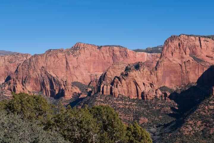 The view of the Kolob Canyons, red rock towering sandstone cliffs, on the west side of the Zion National Park which is considered the less crowded side of the park.