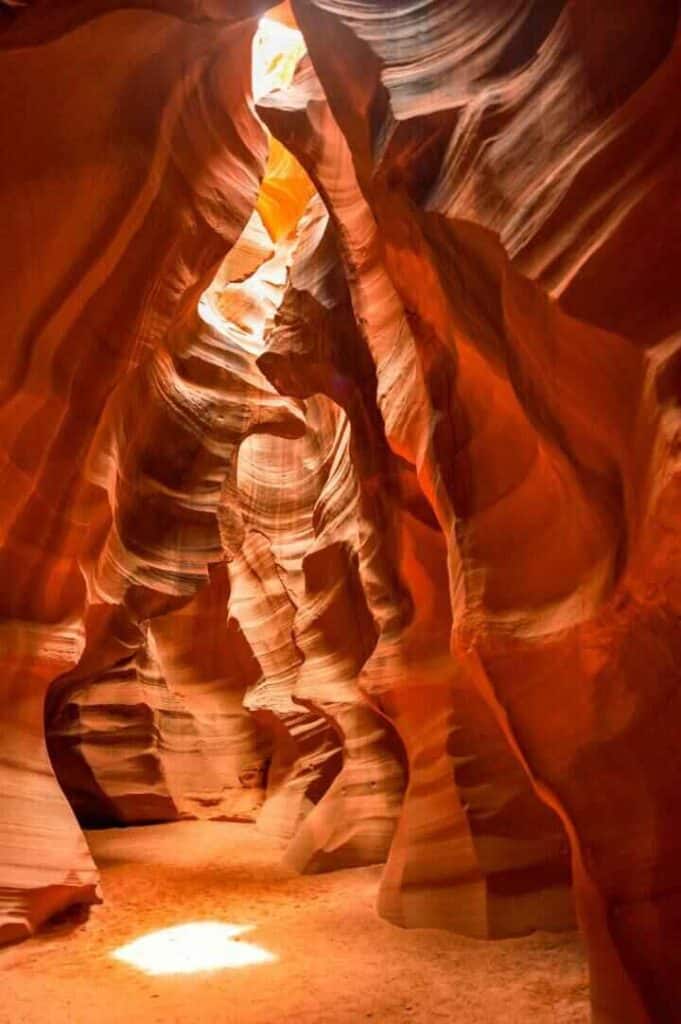 If you're making the drive from Antelope Canyon to Zion National Park, you will need to visit the Upper Antelope Canyon where the famous light beams shine down into the canyon against the orange/red glow of the walls.