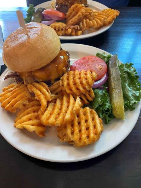 The delicious teriyaki burger and crispy waffle fries served at Memes Cafe in Springdale right outside of the entrance of Zion National Park.