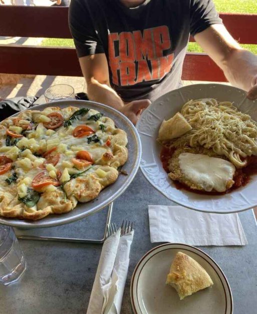 The cheese pizza and chicken parmesan meals we got at Zion Pizza and Noddle Co restaurant in Springdale, Utah.