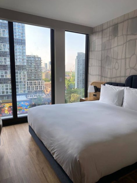 The view of the city from the floor to ceiling windows at TOOR Hotel in Toronto on the 13th floor.