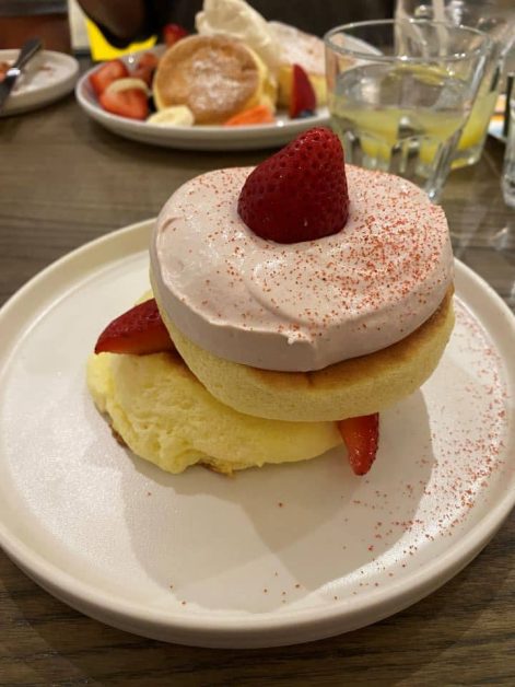 The popular Japanese style pancakes served at Flippers topped with a cream cheese and strawberry mousse and fresh strawberries.