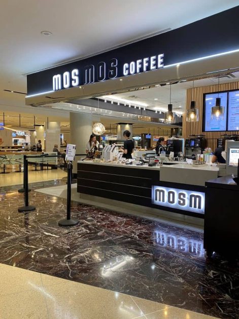 The Mos Mos coffee shop in Toronto that is located in the bottom floor of a business building making it a popular place for locals to grab coffee before starting their work day.