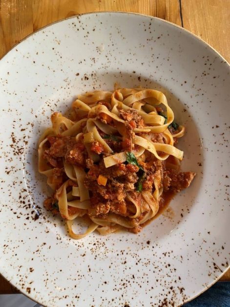 The Bolognese dish from Trattoria Mercatto restaurant which is meat and tomato sauce on top of thick noodles.