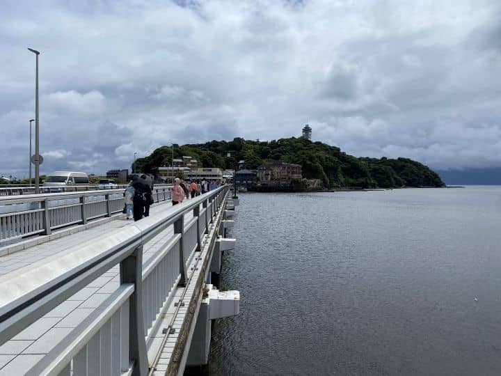 The coastal views of the expansive ocean while walking over the bridge that connects Enoshima to Enoshima Island which is a short trip from Kamakura.