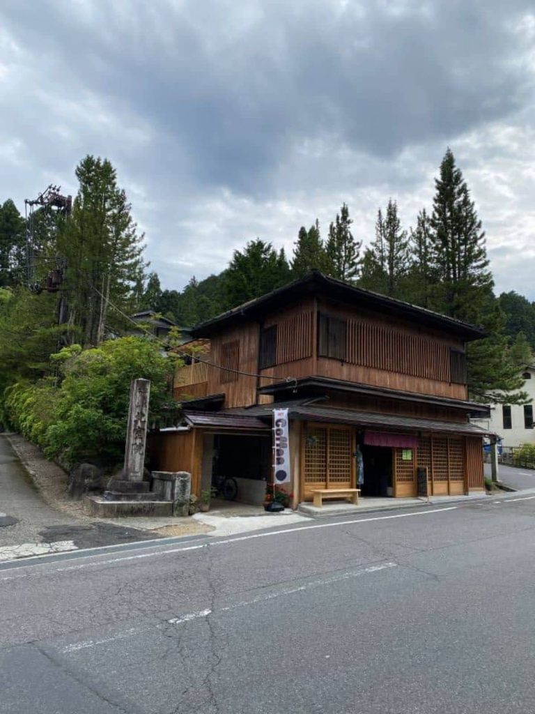The beautiful mountain town of Koyasan and the traditional exterior wooden buildings lining the main street.