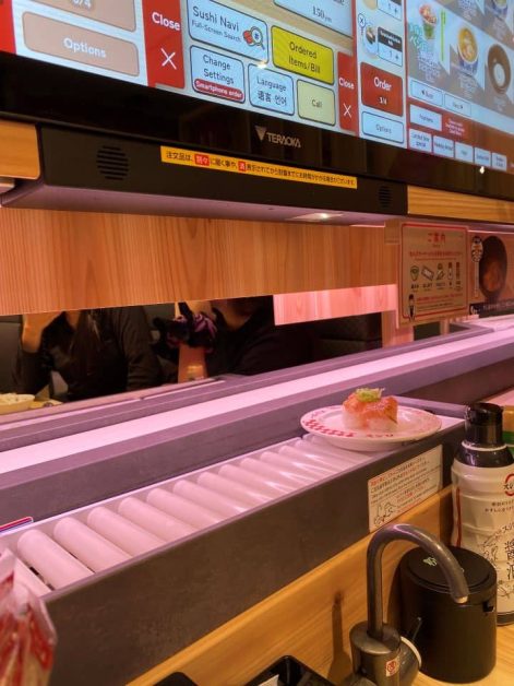 The conveyor belt bringing the sushi we ordered to our table at Sushiro in Tokyo.
