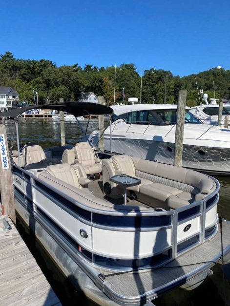 A super nice boat docked at the harbor along Kalamazoo River in Saugatuck, Michigan.