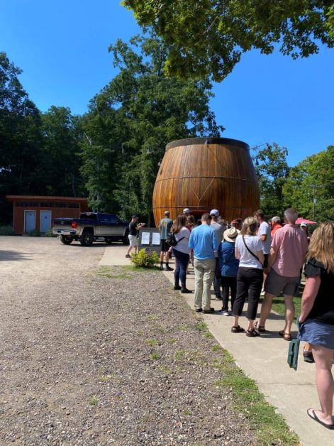 The line waiting to order from Douglas Root Beer Barrel which is a large wooden barrel that has been restored.