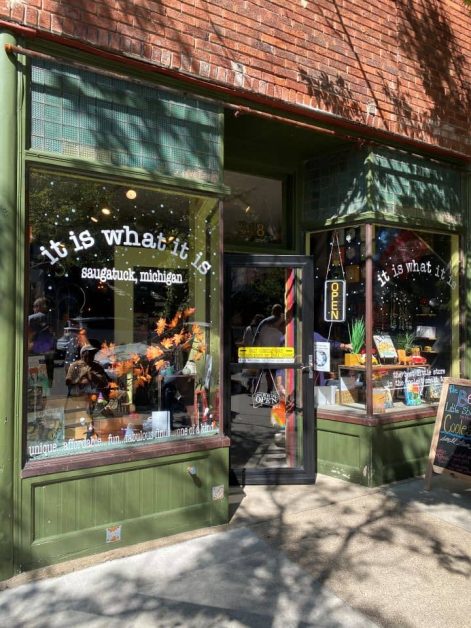 The outside of It Is What It Is gift shop in downtown Saugatuck which is full of unique gift items.