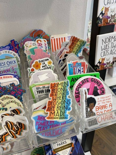 The assortment of stickers sold at Jenni Bick Custom Journals in DuPont Circle that says all women should belong where decisions are being made.