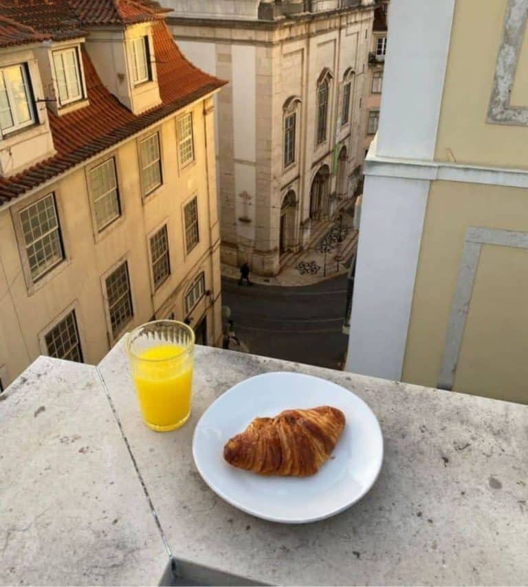 The view from my two-bedroom apartment hotel balcony at The Lisboans where I enjoyed my freshly squeezed orange juice and croissant while overlooking the historic streets.