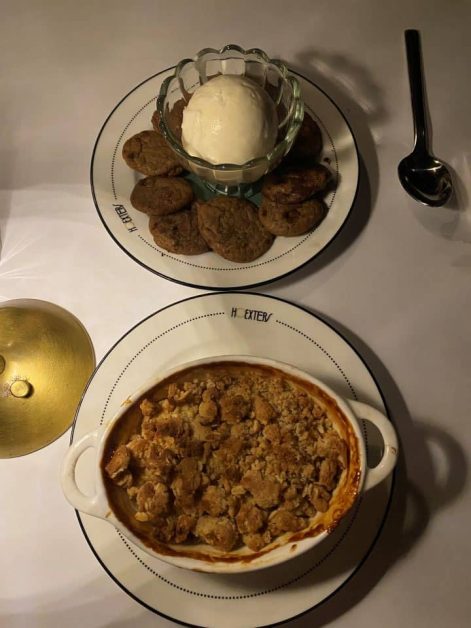 Apple crisp with crumble topping and cookies with ice cream dessert at Hoexter's in New York City.