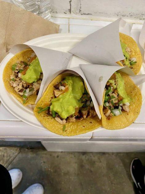 The delicious chicken tacos topped with guacamole, onions, and pico from Los Tacos No 1 in New York City.