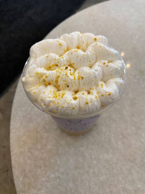 The whipped honey cold foam on top of the popular latte served at Hungry Llama coffee shop in NYC.