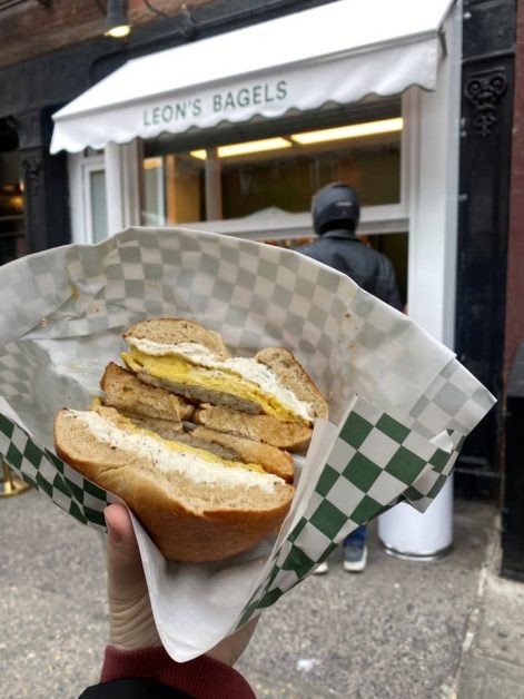 A plain bagel with sausage, egg, garlic herb cream cheese, and hot honey served at Leon's Bagels in New York City.