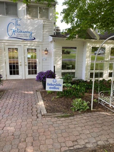 Exterior of The Getaway building with a Lakeside Coffee sign near Lake Geneva, Wisconsin.